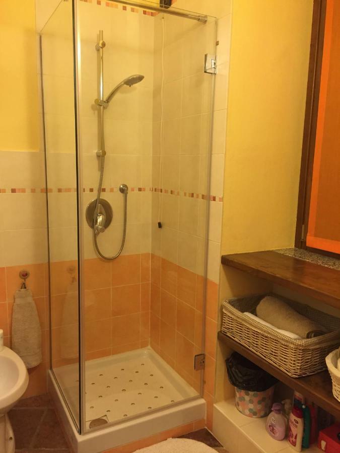 Casa Corte Alla Rocca อาโรนา ภายนอก รูปภาพ